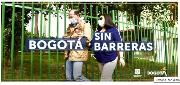 Foto de persona con discapacidad visual y de otra persona que lo guía en la calle Empresas que le apuesten a vincular personas con discapacidad, tendrán beneficios